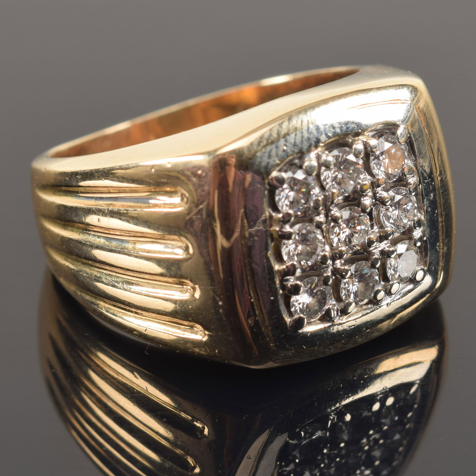 14K gold heavy diamond mounted ring. 9 round cut diamonds. Marked. Ring size 9.5. 15.4 grams. (1 of 6)