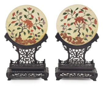 Pair of ink screens. China. 19th century. Hardstone panels set with floral arrangements in