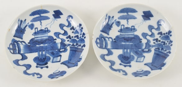 2 blue and white saucer dishes. China. 19th century. Decoration of the hundred antiques. 5.75in.