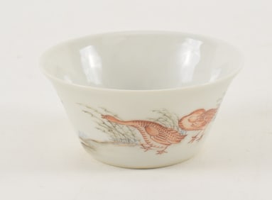 Porcelain cup. China. Ca. 1900. Decoration of wild geese and autumn grasses. Yung Cheng mark.