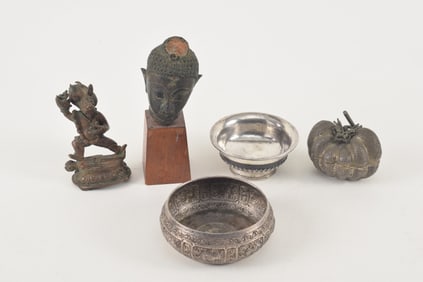 Lot of 5 metal works. To include: an 18th century Thai buddhas head, a 19th century Tibetan image of