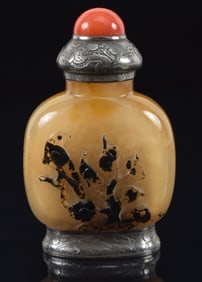 Shadow agate snuff bottle. China. Ca. 1850. French silver mounts set with a coral stopper. Overall