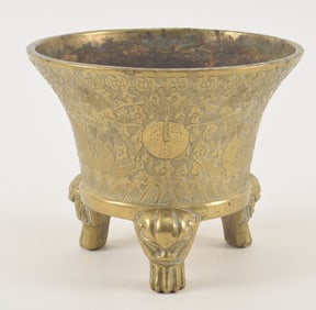 Bronze censer. China. 19th century. Bell form with tripod foo dog feet. Surface engraved with