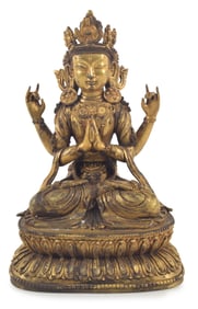 Gilt bronze image of Shadakhshari Lokeshvara. Tibet. 16th century. 12 x 7.5in.