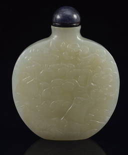 Jade snuff bottle. China. 18th century. Imperial work shop type. Surface finely carved with a: Jade snuff bottle. China. 18th century. Imperial work shop type. Surface finely carved with a landscape. Well hollowed. 2in.