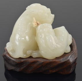 Jade carving. China. 19th century. Celadon stone. Study of a pair of single-horned chih lung. 2.5 x