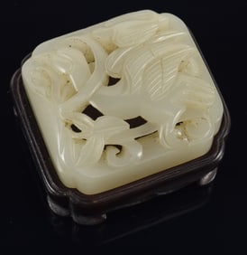 Jade belt plaque. China. Early Ming, 15th century. Carved and pierced with a goose and foliage. 1.5