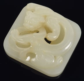 Jade belt plaque. China. Early Ming period (15th century). Carved and pierced with a chih lung. 1.5