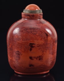 Realgar snuff bottle. China. Ca. 1850. 2.75in. Well hollowed.