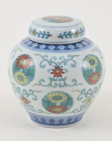 Doucai covered jar. China. Chien Lung mark (1735-1796) and possibly of the period. 5in.