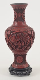 Carved cinnabar vase. China. 19th century. Drilled. 10in.