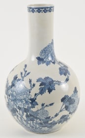 Porcelain vase. China. 19th century. Bottle form. Decoration of flowering plants. Yung Cheng mark.