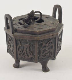 Hexagonal bronze censer. Japan. 19th century. Decoration of Kakihan characters. 4.25 x 4.25in.