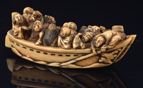 Large netsuke of the ship of wealth. Japan. 19th century. Signed Tsuki with a kakihan. 4.5in.
