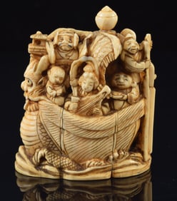 Okimono of the ship of wealth. Japan. 19th century. Signed Gyokotomo. 2.5 x 2.75in.