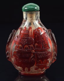 Peking glass snuff bottle. China. Ca. 1850. Cameo cut red to clear. Carving of the Nine Cauldrons of