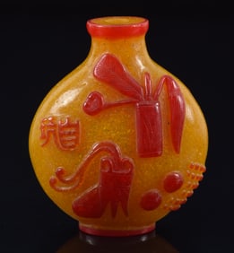 Peking glass snuff bottle. China. Early 20th century. Cameo cut from red to yellow snowflake ground.