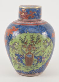 Porcelain covered jar. China. 18th century. Underglaze blue jar and cover with European "clobbered"
