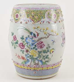 Porcelain garden seat. China. Early 20th century. Barrel form with famille rose decoration of birds