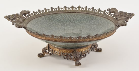 Porcelain charger. China. 19th century. Crackle celadon glaze. Gilt bronze European mounts. 20 x