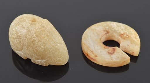 2 archaic jades. Rabbit and a kuang disc. Each about 1in.