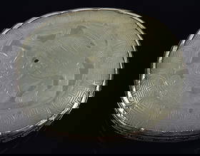 Jade belt plaque. China. 17th century. Ming oval jade set in engraved silver. 2.5in.: Jade belt plaque. China. 17th century. Ming oval jade set in engraved silver. 2.5in.