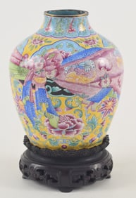 Peking enamel vase. China. Mark and period of Chien Lung (1735-1796). Decorated as a brocade wrapped