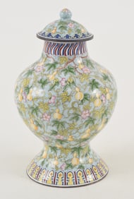 Peking enameled covered jar. Chien Lung mark (1735-1796) and of the period. Decoration of gourds and