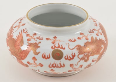 Porcelain water coupe. China. Early 20th century. Iron red and gilt phoenix, dragon and cloud motif.