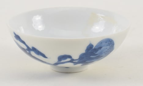 Porcelain cup. China. 20th century. Underglaze blue decoration ju ju be. Yung Cheng mark on base.