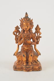 Gilt bronze buddha. China. 19th century. Seated image of Vairocana. Surface gold lacquered. 6in.