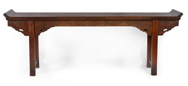 Altar table. China. 18th/19th century. Archaic scrolling and dragon carvings. Huanghuali and other