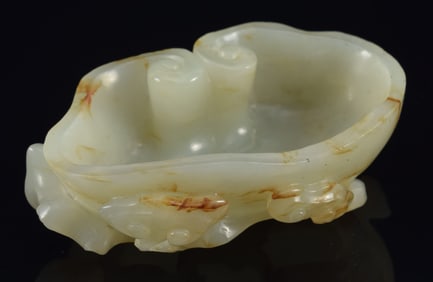 Jade water coupe. China. 19th century. Celadon stone with russet markings carved as ling chih. 3.5 x