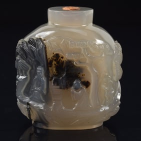 Agate snuff bottle. China. Ca. 1850. Finely carved with figures in a mountain landscape. 2.5in.