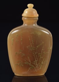 Horn snuff bottle. China. 19th century. Surface inlaid with mother of pearl Shou characters. 2.5in.
