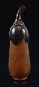 Horn snuff bottle. China. Ca. 1850. Carved in the form of an eggplant. 2.5in.