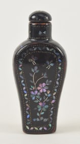 Lac burgaute snuff bottle. China. 19th century. 2.5in.