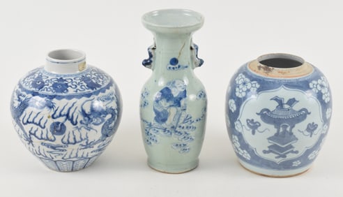 3 porcelains. China. 19th century. To include: a celadon, underglaze blue vase and a dragon jar with
