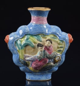 Porcelain snuff bottle. China. Ca. 1890. Molded decoration of women on a pleasure boat. Turquoise