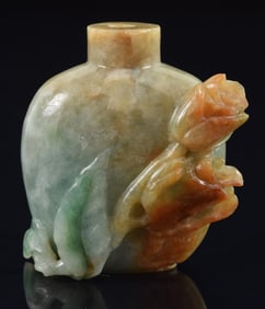 Jade snuff bottle. China. Surface carved with roses and foliage. 1.5in.