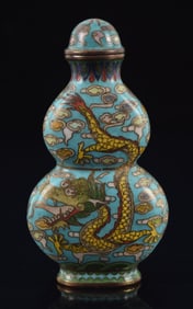 Cloisonne snuff bottle. China. Ca. 1900. Double gourd form. Decoration of dragons and phoenixes on a
