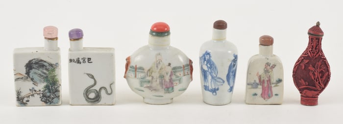 Lot of 6 snuff bottles. China. 5 porcelain, 1 cinnabar like bottle. Each about 2in. Loss.