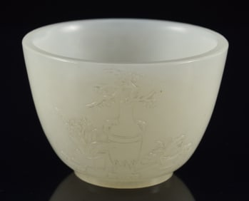 Pure white highly translucent jade wine cup. China. 19th century. 2 x 1.5in.