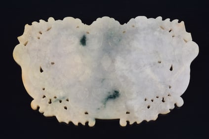 Jadeite plaque. China. 19th century. Carving of bats and archaic scrolling. Lavender stone. 6.25 x