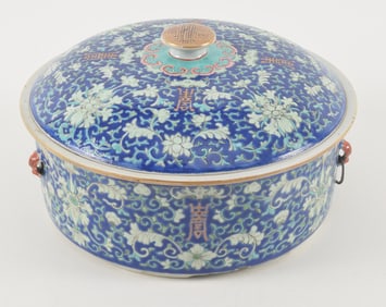 Porcelain covered bowl. China. 19th century. Cobalt blue ground decorated with stylized floral
