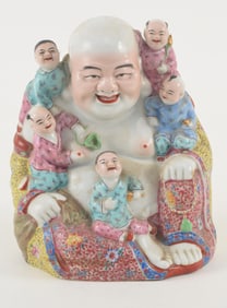 Porcelain figure of Mi Lo Fu. China. Ca. 1930. Famille rose decoration. 10 x 8in.
