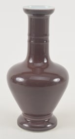 Porcelain vase. China. Yung Cheng mark (1722-1735) and possibly of the period. Aubergine glaze.