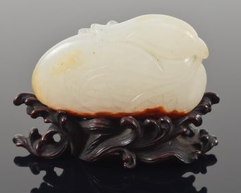 Jade Mandarin duck. China. 18th century. Pure white stone with a red marking carved as a mandarin