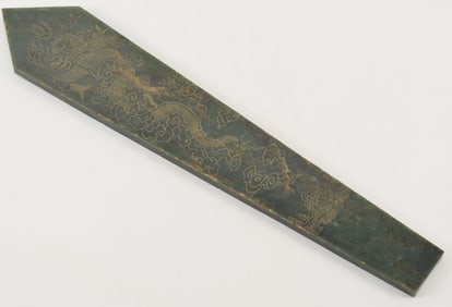 Jade plaque. Kuei form. China. Chien Lung period (1735-1796). Dark green jade. One side engraved and
