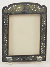 Picture frame. China. Early 20th century. Carved and pierced with birds and flowers in spinach green